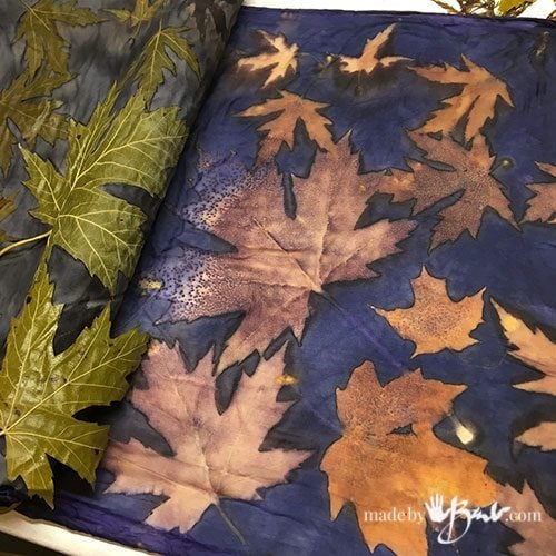 blue background with golden leaf prints
