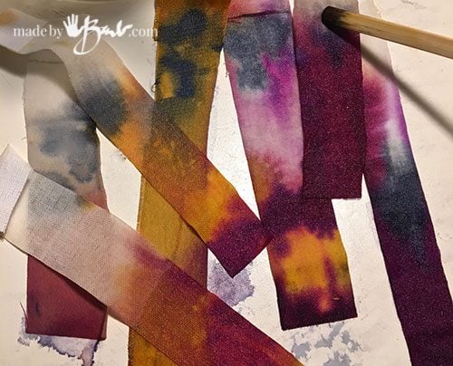 close-up of test strips in many shades of purple