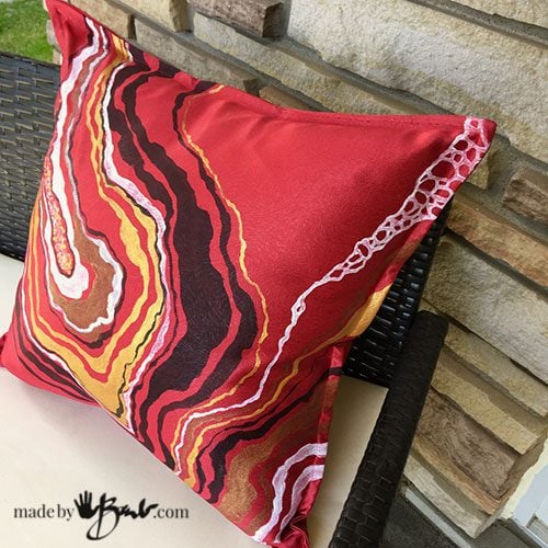 detail painted designs on geode inspired cushion