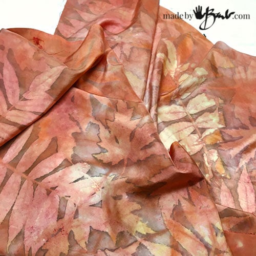 reddish silk scarf with many tones